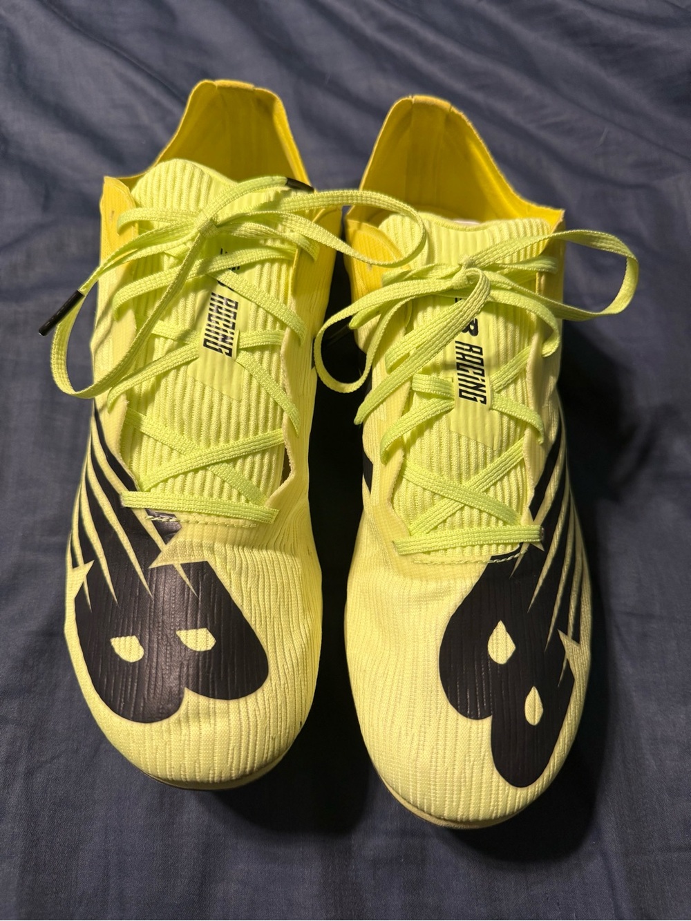 Men's New Balance MD500v7 track spikes in a yellow color way 10.5